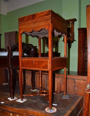 Lot 565 - A Georgian mahogany enclosed washstand converted to a bijouterie cabinet