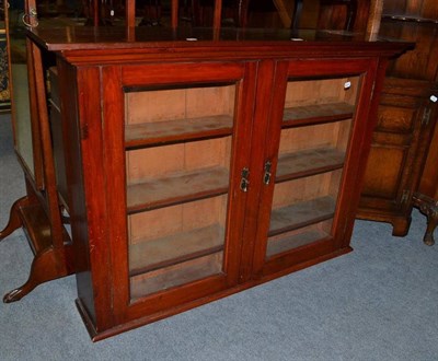 Lot 580 - The upper section to a Georgian mahogany bookcase and a piano stool