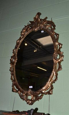 Lot 584 - Gilt framed oval wall mirror