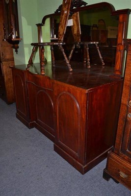 Lot 587 - A Victorian mahogany serpentine-shaped mirror back sideboard