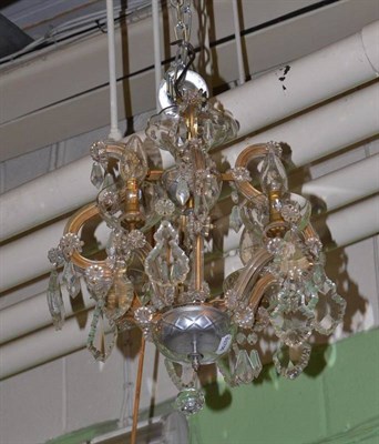 Lot 615 - A cut glass light fitting with facetted pear drops