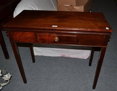 Lot 639 - George III mahogany fold-over tea table