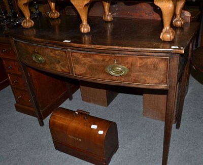 Lot 655 - A mahogany bow front two drawer serving table