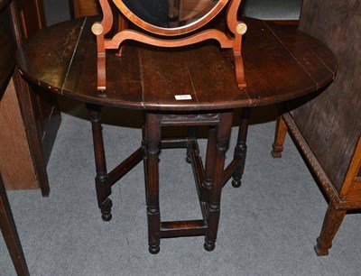 Lot 656 - An small oak gateleg table