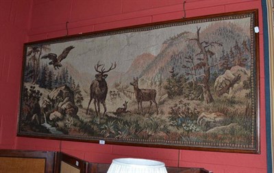 Lot 661 - Modern machine worked tapestry in a mahogany frame, depicting stags in a wooded landscape