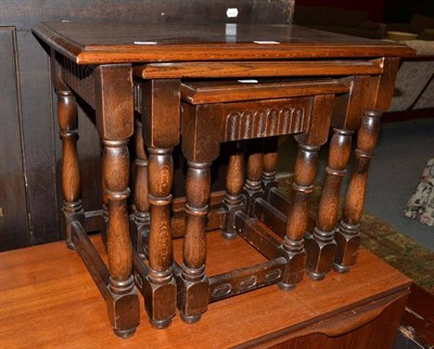 Lot 669 - An oak nest of tables