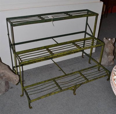 Lot 737 - A three tier metal plant stand