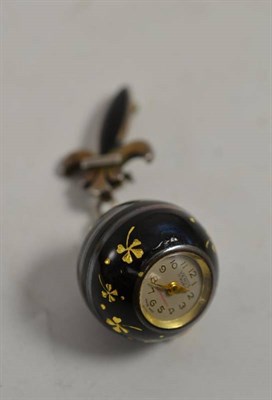 Lot 12 - A lady's enamel ball watch, circa 1950, lever movement, silvered dial with Arabic numerals,...