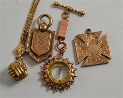 Lot 21 - A gold plated locket, a gold plated Maltese cross, a 9ct gold watch fob set with a compass and...