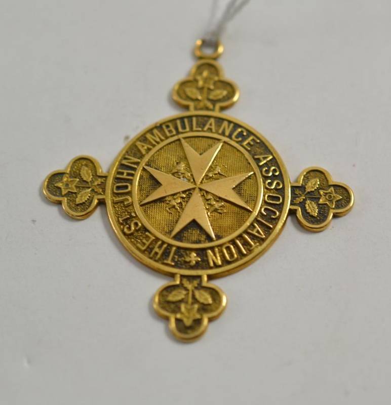 Lot 23 - An 18ct gold St John Ambulance cross medal, hall marked with maker's mark 'W&S', Birmingham 1914
