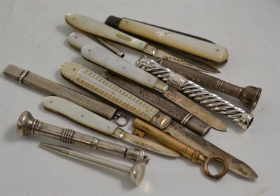 Lot 28 - A collection of small silver comprising: two cigar punches; six mother of pearl handled fruit...