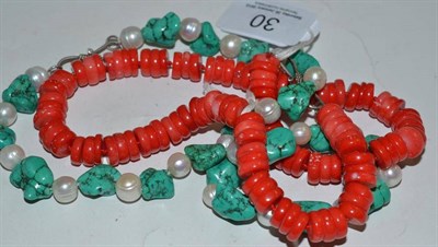 Lot 30 - A turquoise and cultured pearl necklace and a coral type bead necklace