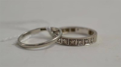 Lot 36 - A platinum band ring and a half hoop ring (2)