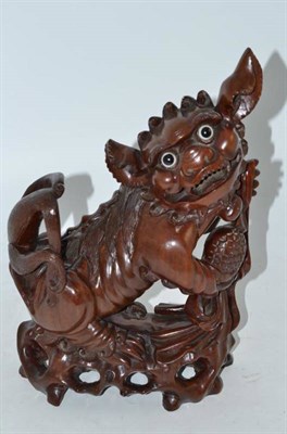 Lot 48 - Chinese dog of fo root carving, height 32cm