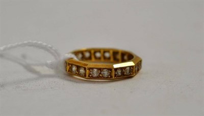 Lot 107 - An 18ct gold full eternity ring