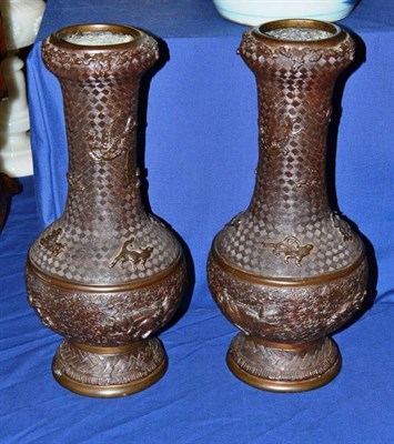 Lot 142 - Pair of Japanese bronze vases decorated with dragons, height 34cm