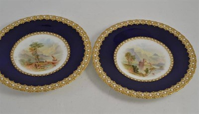 Lot 152 - A pair of 19th century English porcelain cabinet plates, painted with Loch Lomond and Kilchurn...