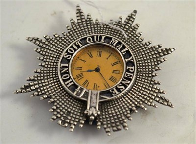 Lot 162 - A silver cased garter watch