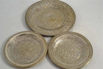 Lot 163 - Three African white metal dishes with extensive chased decoration (3)