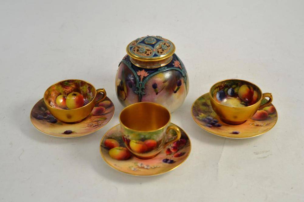 Lot 165 - A Royal Worcester miniature cup and saucer painted with fruit by Ricketts, date code for 1915,...