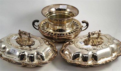 Lot 176 - A pair of silver plated entree dishes and covers and a silver plated warming dish (3)