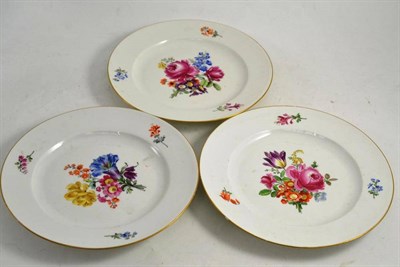 Lot 178 - A set of three Meissen plates each painted with floral spray