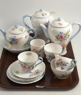 Lot 179 - A Shelley Wild Flowers tea service 13668, including teapot, hot water jug and coffee pot, some...