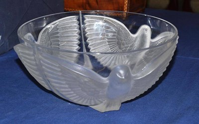 Lot 188 - A moulded glass bowl decorated with birds of prey, 26cm diameter