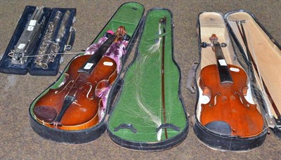 Lot 193 - Two full size violins, two bows, a music stand and flute