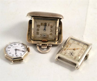 Lot 214 - A silver Art Deco tank cased, wristwatch, 37mm by 27mm, a silver cased purse watch and a lady's...