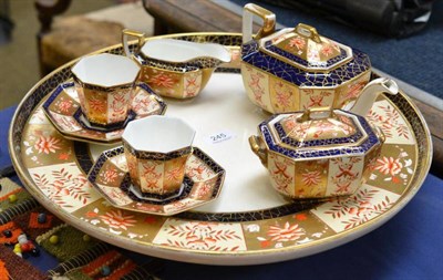 Lot 245 - A Wedgwood Imari pattern Lazy Susan, teapot, sugar bowl, milk jug, two cups and three saucers
