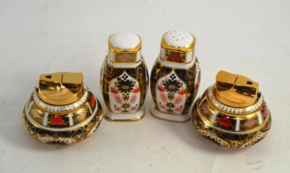 Lot 262 - A pair of Royal Crown Derby 'Imari' pattern 1128 table lighters and pepperettes