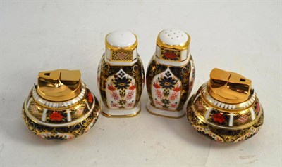 Lot 262 - A pair of Royal Crown Derby 'Imari' pattern 1128 table lighters and pepperettes
