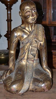 Lot 277 - Gilt wood carved Buddha figure, height 65cm