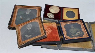 Lot 285 - Four daguerreotypes, two photographs and miniatures