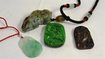 Lot 298 - A Chinese jade/jadeite bat and cash pendant, a three rat and fruit pendant, a Chinese carved...