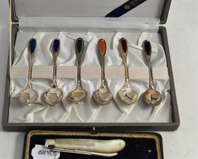 Lot 300 - A set of six Chinese white metal and enamel teaspoons, cased and a silver and mother of pearl fruit