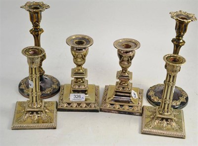 Lot 326 - A pair of silver plated Corinthian column candlesticks, 18cm high, a pair of square section...