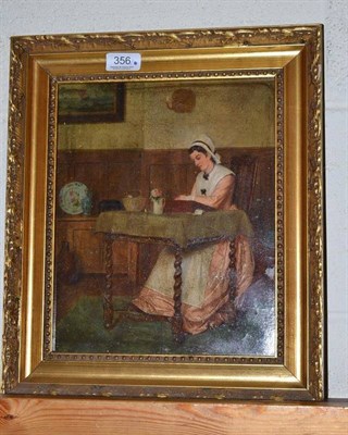 Lot 356 - Oil of a lady writing at a table