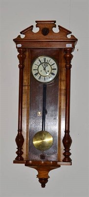 Lot 375 - A twin weight Vienna style wall clock