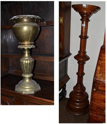 Lot 377 - Carved oak plant pedestal (height 150cm) and a brass planter