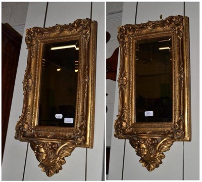 Lot 381 - A pair of gilt mirrors