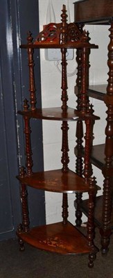 Lot 384 - A Victorian rosewood four tier whatnot