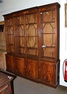 Lot 387 - Reproduction mahogany breakfront bookcase