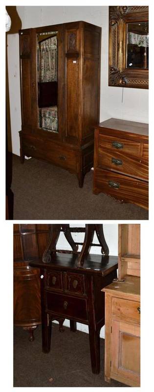 Lot 390 - A carved oak wardrobe, a three height chest and a modern side cabinet