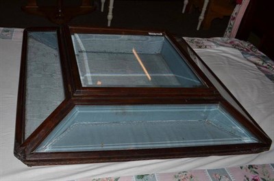 Lot 401 - An unusual square oak framed glazed display cabinet with bevelled glass panels