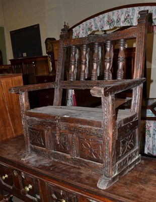 Lot 407 - A joined oak settle of small proportions