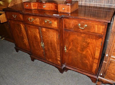 Lot 409 - A reproduction break front sideboard