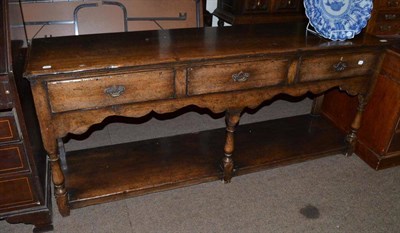 Lot 422 - Oak dresser base in 17th century style