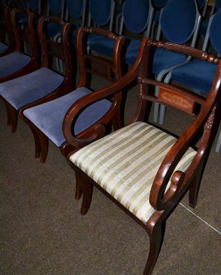 Lot 434 - A set of five chairs in Regency style with brass inlay, including one carver